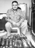 Accused Major (retd) Harish Chander Sharma in a Nelson Mandela look-alike shirt with his collection of shoes. A file photo