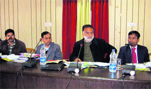 Dr Rajan Sushant addresses a meeting of officers at Chamba on Thursday.