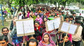 Non- gazetted employees union protest against the University of Jammu authorities in Jammu on Friday.