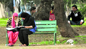 Students exchange notes in University of Jammu on Friday.