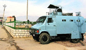 CRPF personnel stand guard near main Eidgah during curfew in Srinagar on Friday.