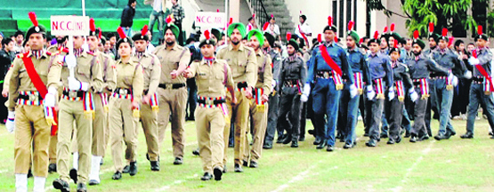 NCC cadets of DAV College participate in a march past during the 58th annual sports and athletic meet in Amritsar on Saturday. A Tribune photo