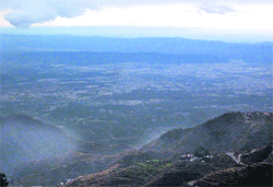 A view of the Doon valley from Mussoorie as the weather cleared for some time on Saturday.
