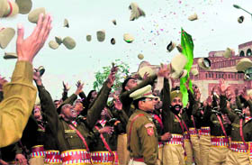 Young officers celebrate after their passing-out parade at the CRPF Academy in Kadarpur, Gurgaon, on Saturday.