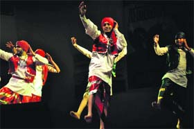 Joys of youth: Students perform bhangra during the annual day celebrations of Sarvodya Institute at Police Auditorium in Jammu on Saturday