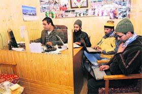 A group of mediapersons surf the Internet on Saturday