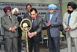 Punjab and Haryana High Court Chief Justice AK Sikri lights the ceremonial lamp during a function at Judicial Complex in Bathinda on Saturday. Tribune photo: Pawan Sharma