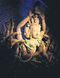 The Bodhisattva: A Thousand Arms, a Thousand Eyes Sculpture in Terracotta by Loretta Yang