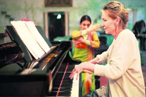 Elizabeth Sombart (above) playing the piano during the performance
