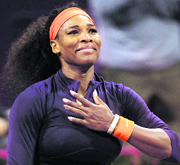 Serena Williams celebrates after winning against Czech Republic's Petra Kvitova in their WTA Qatar Ladies Open quarterfinal in Doha.  AP
