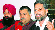 Members of the Folklore Research Academy address mediapersons in Amritsar on Sunday