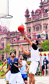 A basketball match in progress on the last day of Punjab police games at Khalsa College on Sunday