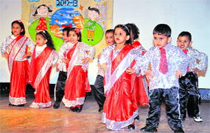 Tiny tots present a dance item during the annual function of First Edge Pre-School in Dera Bassi on Sunday.