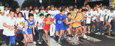 Residents take part in the marathon at the Rock Garden in Chandigarh on Sunday.