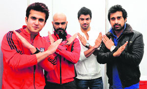 Raghu (second from left) and Rann Vijay (extreme right), ex-roadies, during the marathon inauguration function at the Rock Garden in Chandigarh on Sunday.