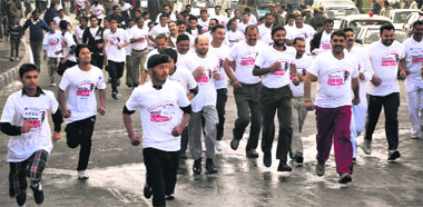Participants during the marathon dedicated to dignity and pride of Indian women at MA Stadium in Jammu on Sunday.