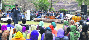 A participant takes part in the musical programme in Rajouri on Sunday. 