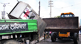 The anti-encroachment drive in progress on Ferozepur Road in Ludhiana on Sunday