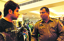 A police officer asks a complainant about his loss in Ludhiana on Sunday