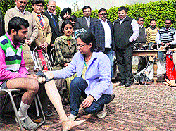 Artificial limbs being distributed among the differently abled at Freemasons Hall, Sarabha Nagar, Ludhiana
