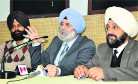 HS Phoolka (centre) addresses the media in Chandigarh on Sunday