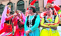 Women dressed in ethnic costumes at the Chinese New Year Twilight Parade in Sydney on Sunday