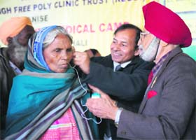 A patient being examined at a free multi-speciality medical camp at Parcha village on Monday