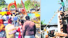 A drive under way against illegal structures in the marble market, near Dhanas, in Chandigarh on Monday