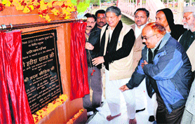 Harish Rawat inaugurates a development project in Haridwar on Monday.