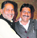 BJP president Ram Bilas Sharma greets former Pundri MLA and parliamentary secretary Naresh Sharma after he joined the BJP in Chandigarh on Monday. Tribune photo: Manoj Mahajan 