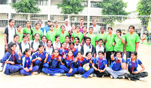 Volleyball teams of Khanpur Kalan polytechnic (In blue dress) and of the Faridabad polytechnic. 