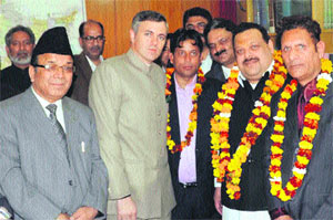 Chief Minister Omar Abdullah with party candidates nominated for elections to the Legislative Council in Jammu on Monday.