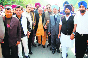 Ustad Puran Chand Wadali along with singers and artistes take part in an awareness march to mark Mother Tongue Day in Amritsar on Tuesday.