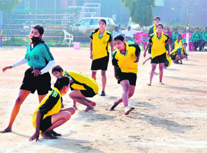 A match in progress in the All-India Inter-University Kho-Kho (Women) Championship at GNDU on Tuesday.