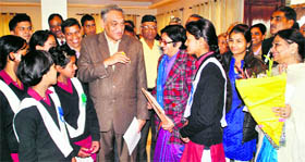 Chief Minister Vijay Bahuguna with the Principal and students of Sanatan Dharam Inter-College, Mussoorie, in Dehradun on Tuesday.
