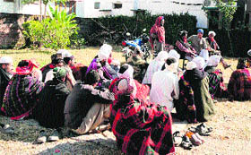 A group of Van Gujjars from Rajaji National Park at the RLEK office in Dehradun on Tuesday.