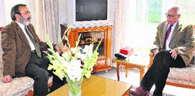 Governor NN Vohra with Chief Secretary Iqbal Khanday at Raj Bhawan in Jammu on Tuesday