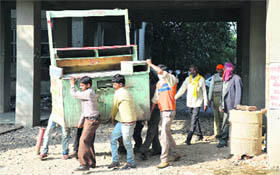 MC workers during the anti-encroachment drive in Ludhiana on Tuesday.