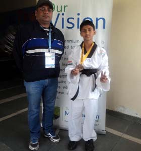 Japnam Singh (right) and his coach Ravinder Singh Rajput