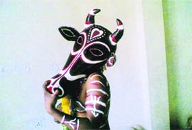 A participant performs Hilljatra show