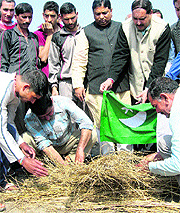 Protesters burn a Pakistani flag in Molu Pargwal village in Akhnoor on Wednesday