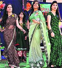 Students of Gurukul School participate in a modelling contest during a farewell party in Jalandhar on Wednesday