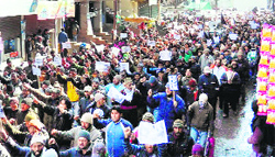 Residents hold a protest rally in Kargil on Wednesday. A Tribune photograph