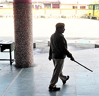 A policeman at the bus terminus