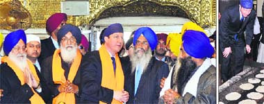 British Prime Minister David Cameron (third from left) with Chief Minister Parkash Singh Badal and SGPC chief Avtar Singh Makkar ( extreme left) at the Golden Temple in Amritsar on Wednesday; and (right) the British Prime Minister at the gurdwaras community kitchen