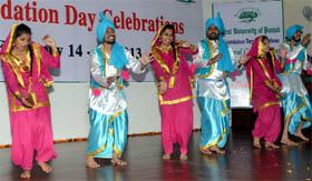 Students present a dance item at the poetry and singing competition held at Central University of Punjab.