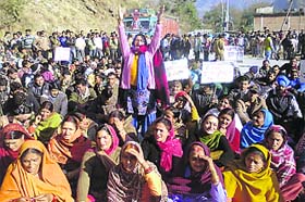 Kol Dam oustees stage a dharna at Harnoda in Bilaspur on Thursday