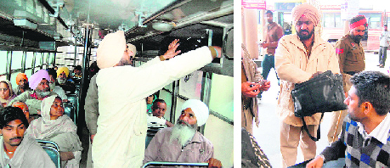 Policemen check bags of passengers inside a bus and at the bus stand in Amritsar on Friday. Photos: Sameer Sehgal