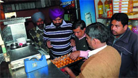 Health officials conduct a surprise checking at a sweet shop near the bus stand in Bathinda.