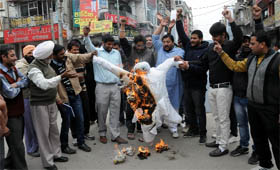 Activists of the Akhil Bharatiya Vidyarthi Parishad (ABVP) burn the effigy of terrorism at Sadbhavna Chowk in the city on Friday.